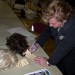 Ilya Salkind authenticated these Marlon Brando and Gene Hackman wigs for a fan at the Superboy reunion in Los Angeles, January 2012. He is seen here autographing the costume department's tag.