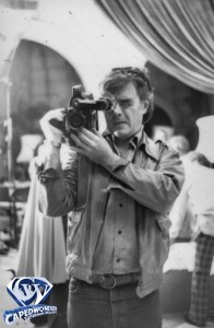 Richard Donner uses an ARRI 16mm film camera, likely one of the cameras used to film the vintage documentaries.