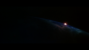 CapedWonder-STM-Superman-smiles-above-earth-001