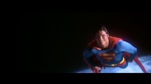 CapedWonder-STM-Superman-smiles-above-earth-081
